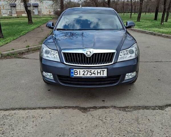 Серый Шкода Октавия, объемом двигателя 1.6 л и пробегом 142 тыс. км за 8300 $, фото 1 на Automoto.ua