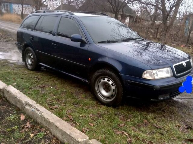 Синий Шкода Октавия, объемом двигателя 2 л и пробегом 412 тыс. км за 2350 $, фото 1 на Automoto.ua