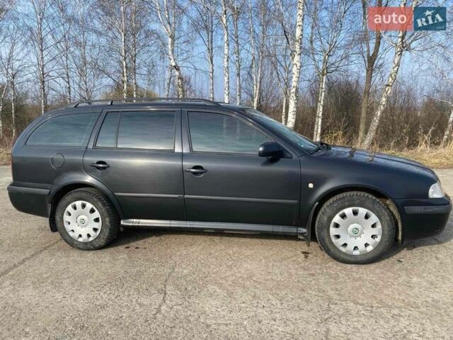 Синий Шкода Октавия, объемом двигателя 1.6 л и пробегом 252 тыс. км за 4950 $, фото 1 на Automoto.ua