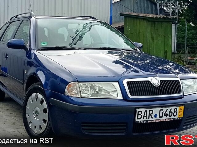 Синий Шкода Октавия, объемом двигателя 1.6 л и пробегом 210 тыс. км за 5600 $, фото 1 на Automoto.ua