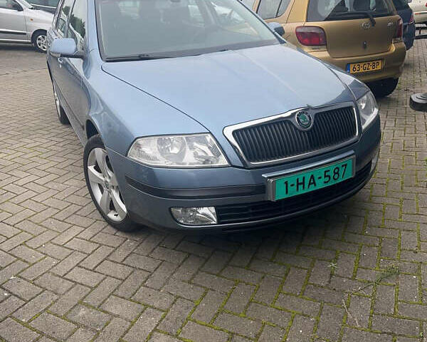 Синий Шкода Октавия, объемом двигателя 2 л и пробегом 215 тыс. км за 6500 $, фото 1 на Automoto.ua