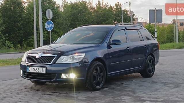 Синий Шкода Октавия, объемом двигателя 1.6 л и пробегом 235 тыс. км за 5600 $, фото 1 на Automoto.ua