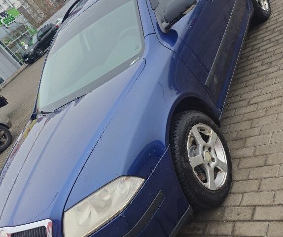 Синий Шкода Октавия, объемом двигателя 1.6 л и пробегом 249 тыс. км за 5499 $, фото 1 на Automoto.ua