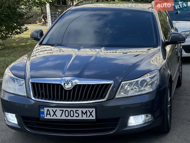 Синий Шкода Октавия, объемом двигателя 1.8 л и пробегом 245 тыс. км за 9200 $, фото 1 на Automoto.ua