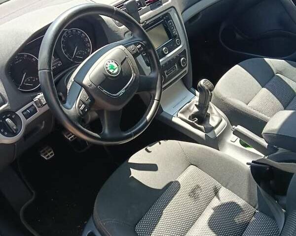 Синий Шкода Октавия, объемом двигателя 1.8 л и пробегом 162 тыс. км за 9100 $, фото 1 на Automoto.ua