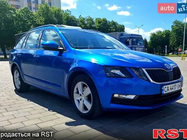 Синий Шкода Октавия, объемом двигателя 2 л и пробегом 211 тыс. км за 14200 $, фото 1 на Automoto.ua