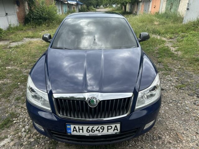 Синий Шкода Октавия, объемом двигателя 2 л и пробегом 230 тыс. км за 8700 $, фото 1 на Automoto.ua