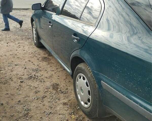 Зеленый Шкода Октавия, объемом двигателя 1.6 л и пробегом 98 тыс. км за 3700 $, фото 1 на Automoto.ua
