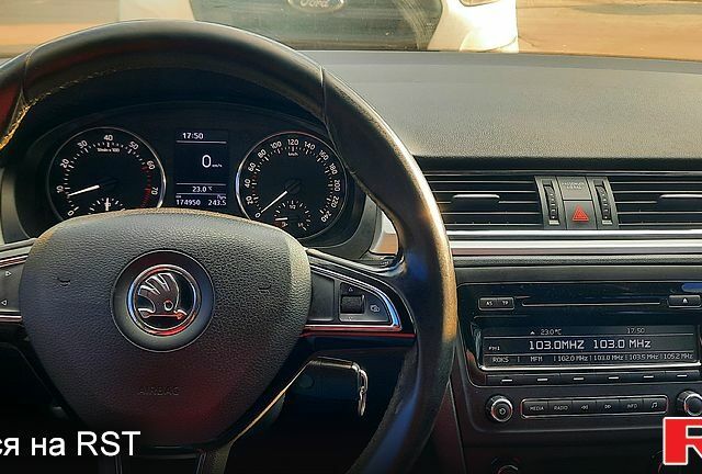 Белый Шкода Рапид, объемом двигателя 1.2 л и пробегом 176 тыс. км за 5500 $, фото 1 на Automoto.ua