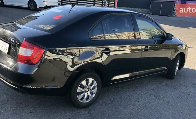 Чорний Шкода Рапід, об'ємом двигуна 1.2 л та пробігом 170 тис. км за 9700 $, фото 1 на Automoto.ua
