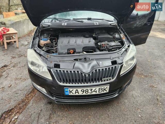 Черный Шкода Румстер, объемом двигателя 1.6 л и пробегом 205 тыс. км за 5000 $, фото 1 на Automoto.ua