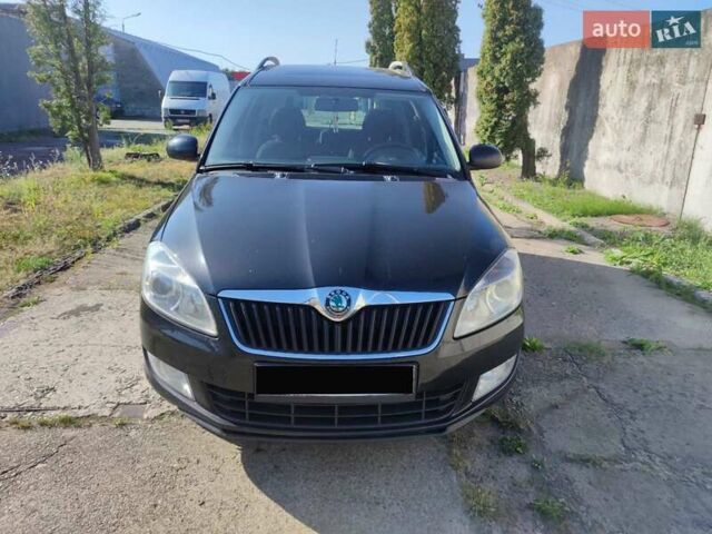 Черный Шкода Румстер, объемом двигателя 1.6 л и пробегом 355 тыс. км за 6950 $, фото 1 на Automoto.ua