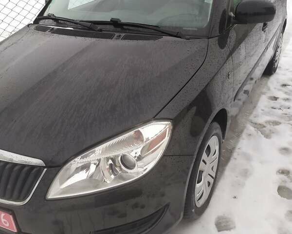 Черный Шкода Румстер, объемом двигателя 1.2 л и пробегом 209 тыс. км за 5999 $, фото 1 на Automoto.ua