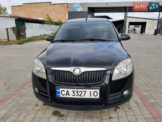 Черный Шкода Румстер, объемом двигателя 1.4 л и пробегом 227 тыс. км за 5600 $, фото 1 на Automoto.ua