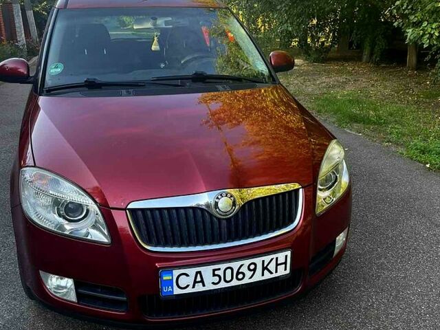 Красный Шкода Румстер, объемом двигателя 1.4 л и пробегом 254 тыс. км за 5200 $, фото 1 на Automoto.ua