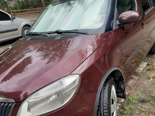 Червоний Шкода Румстер, об'ємом двигуна 1.4 л та пробігом 200 тис. км за 5600 $, фото 1 на Automoto.ua