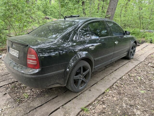 Черный Шкода Суперб, объемом двигателя 1.8 л и пробегом 290 тыс. км за 3100 $, фото 1 на Automoto.ua