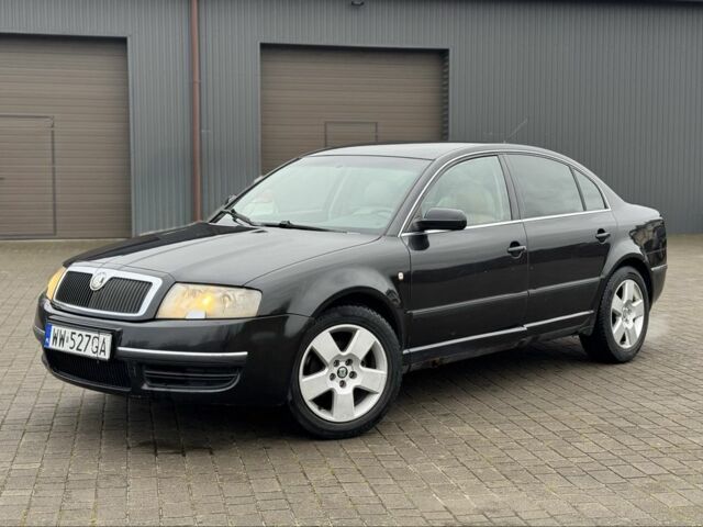 Черный Шкода Суперб, объемом двигателя 1.9 л и пробегом 397 тыс. км за 2450 $, фото 1 на Automoto.ua