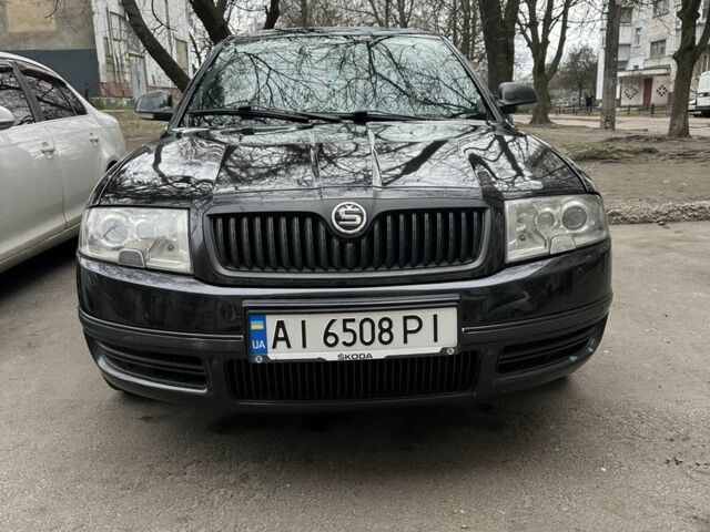 Черный Шкода Суперб, объемом двигателя 2.5 л и пробегом 290 тыс. км за 4900 $, фото 1 на Automoto.ua
