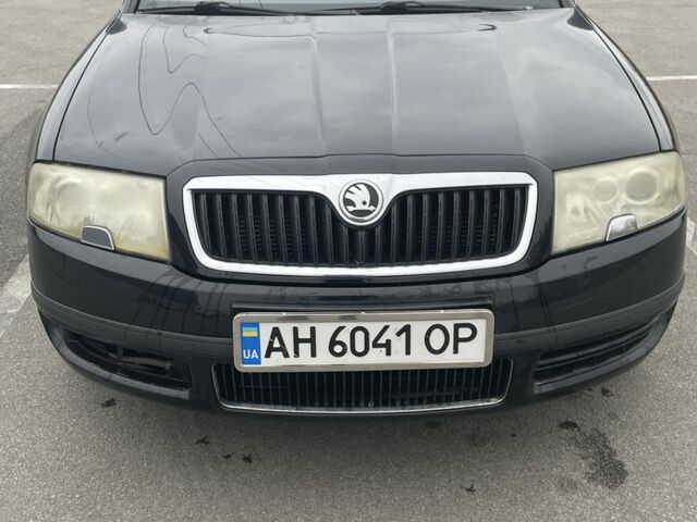 Черный Шкода Суперб, объемом двигателя 1.9 л и пробегом 216 тыс. км за 5100 $, фото 1 на Automoto.ua