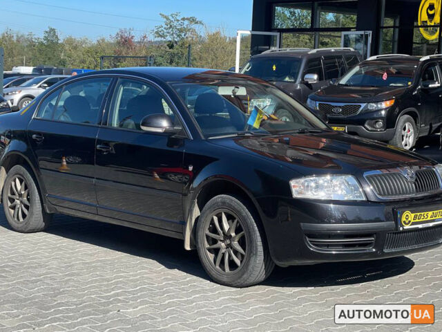 Черный Шкода Суперб, объемом двигателя 1.8 л и пробегом 115 тыс. км за 6899 $, фото 1 на Automoto.ua