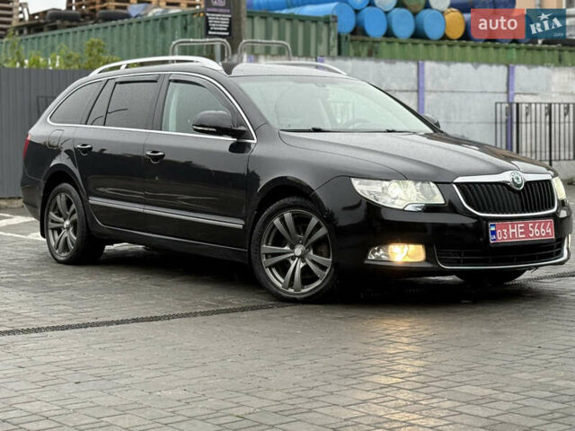 Чорний Шкода Суперб, об'ємом двигуна 2 л та пробігом 193 тис. км за 10799 $, фото 1 на Automoto.ua