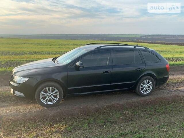 Черный Шкода Суперб, объемом двигателя 1.6 л и пробегом 199 тыс. км за 8500 $, фото 1 на Automoto.ua