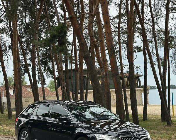 Черный Шкода Суперб, объемом двигателя 1.97 л и пробегом 203 тыс. км за 23999 $, фото 1 на Automoto.ua