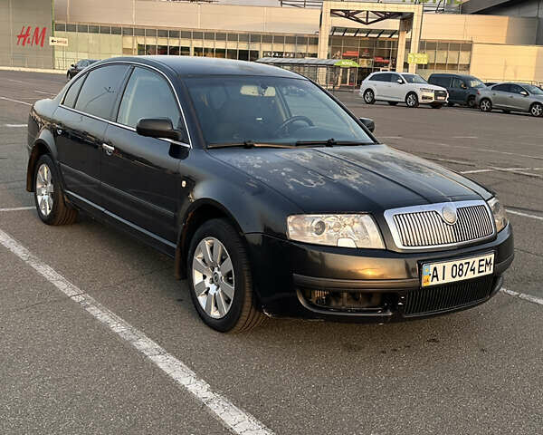 Черный Шкода Суперб, объемом двигателя 2.5 л и пробегом 372 тыс. км за 3500 $, фото 1 на Automoto.ua