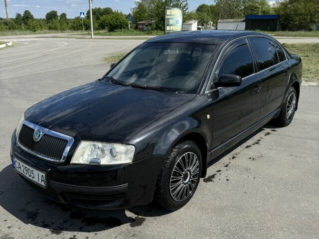 Черный Шкода Суперб, объемом двигателя 1.9 л и пробегом 419 тыс. км за 4800 $, фото 1 на Automoto.ua