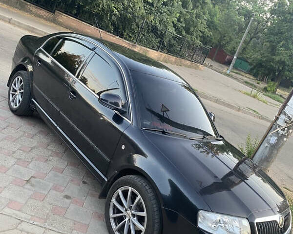 Черный Шкода Суперб, объемом двигателя 1.8 л и пробегом 215 тыс. км за 7000 $, фото 1 на Automoto.ua