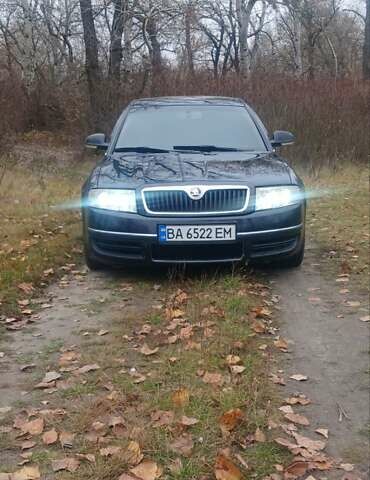 Черный Шкода Суперб, объемом двигателя 2.5 л и пробегом 403 тыс. км за 6500 $, фото 1 на Automoto.ua