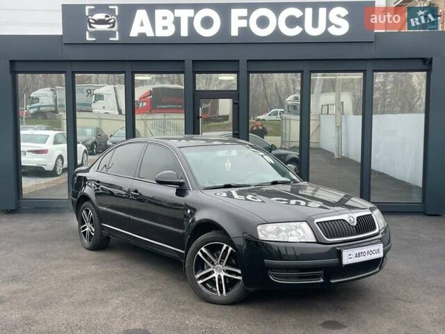 Черный Шкода Суперб, объемом двигателя 1.8 л и пробегом 261 тыс. км за 7990 $, фото 1 на Automoto.ua