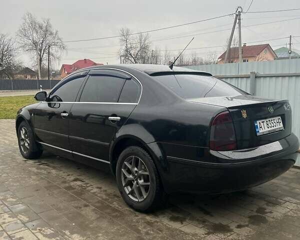 Черный Шкода Суперб, объемом двигателя 1.9 л и пробегом 291 тыс. км за 7000 $, фото 1 на Automoto.ua