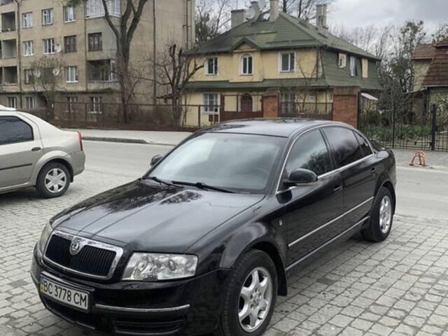 Черный Шкода Суперб, объемом двигателя 2.5 л и пробегом 265 тыс. км за 6729 $, фото 1 на Automoto.ua