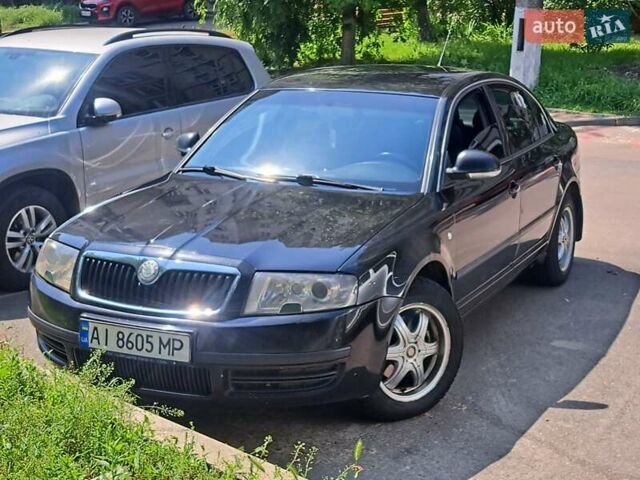 Черный Шкода Суперб, объемом двигателя 1.9 л и пробегом 362 тыс. км за 5500 $, фото 1 на Automoto.ua