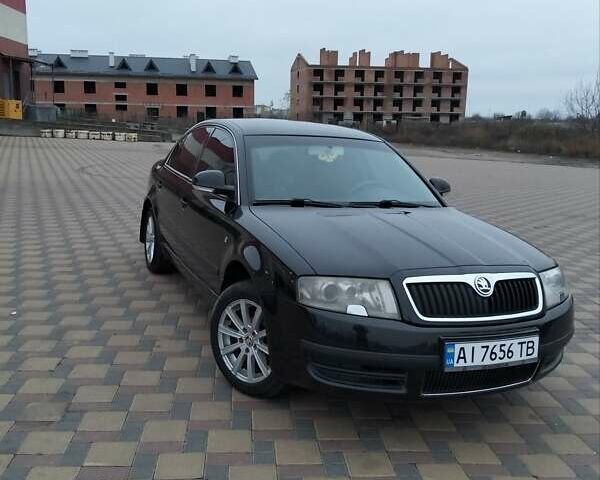 Черный Шкода Суперб, объемом двигателя 1.9 л и пробегом 240 тыс. км за 5600 $, фото 1 на Automoto.ua