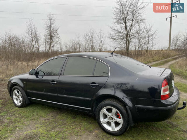 Черный Шкода Суперб, объемом двигателя 1.8 л и пробегом 260 тыс. км за 6000 $, фото 1 на Automoto.ua