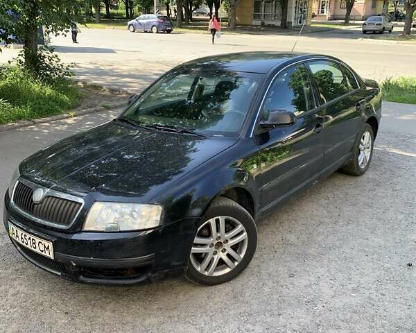 Черный Шкода Суперб, объемом двигателя 1.8 л и пробегом 248 тыс. км за 5400 $, фото 1 на Automoto.ua