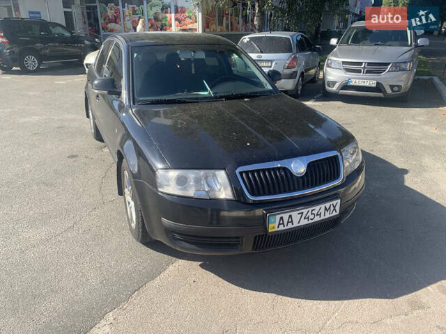 Черный Шкода Суперб, объемом двигателя 1.8 л и пробегом 237 тыс. км за 5800 $, фото 1 на Automoto.ua
