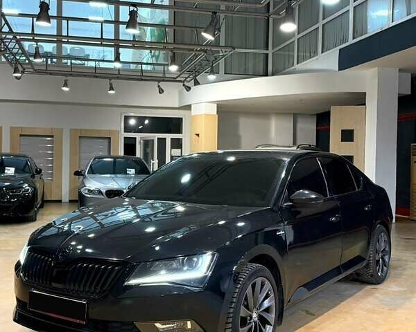 Черный Шкода Суперб, объемом двигателя 1.98 л и пробегом 174 тыс. км за 17199 $, фото 1 на Automoto.ua