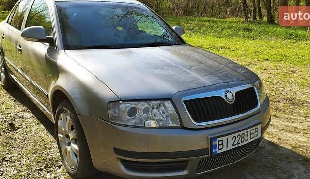 Сірий Шкода Суперб, об'ємом двигуна 2.5 л та пробігом 286 тис. км за 8000 $, фото 1 на Automoto.ua