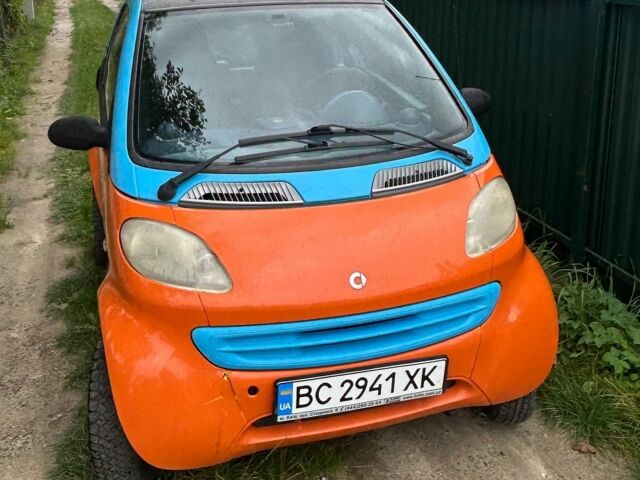 Помаранчевий Смарт Fortwo, об'ємом двигуна 0.6 л та пробігом 232 тис. км за 2300 $, фото 1 на Automoto.ua