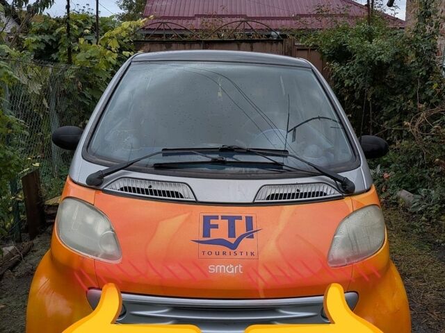 Помаранчевий Смарт Fortwo, об'ємом двигуна 0.6 л та пробігом 143 тис. км за 2300 $, фото 1 на Automoto.ua