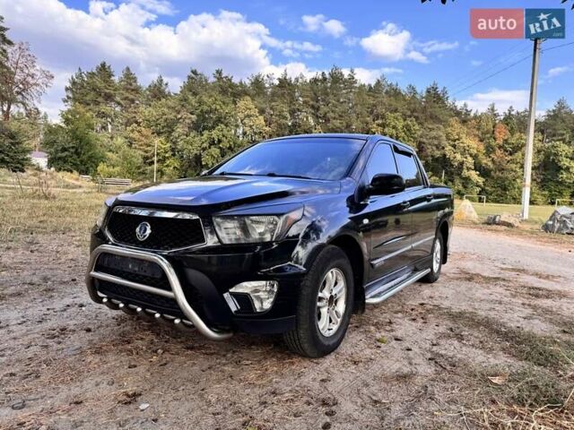 Черный Cанг Йонг Актион, объемом двигателя 2 л и пробегом 240 тыс. км за 8700 $, фото 1 на Automoto.ua