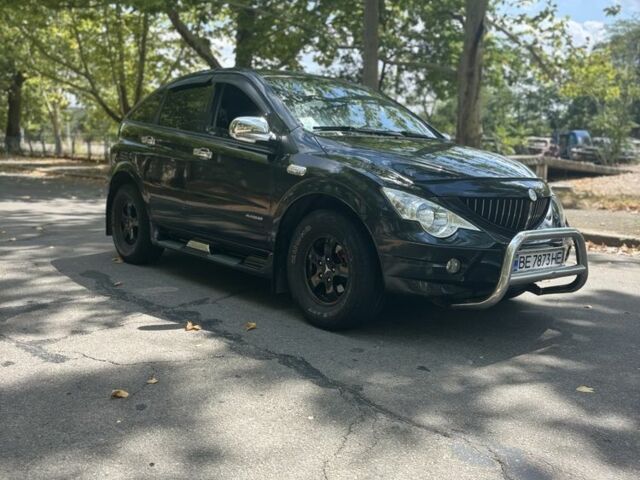 Черный Cанг Йонг Актион, объемом двигателя 2 л и пробегом 266 тыс. км за 7500 $, фото 1 на Automoto.ua