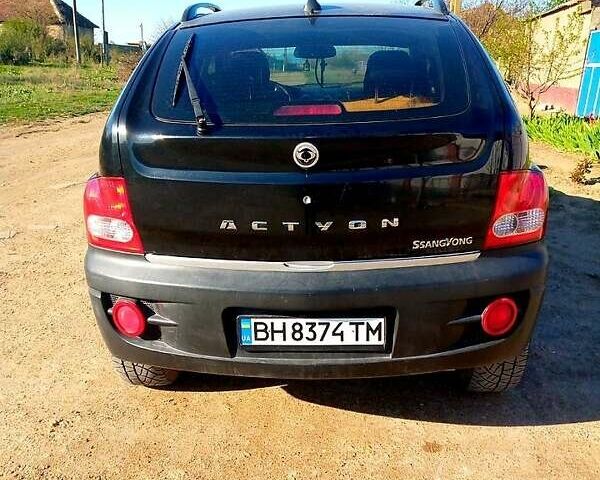 Черный Cанг Йонг Актион, объемом двигателя 2.3 л и пробегом 240 тыс. км за 4900 $, фото 1 на Automoto.ua