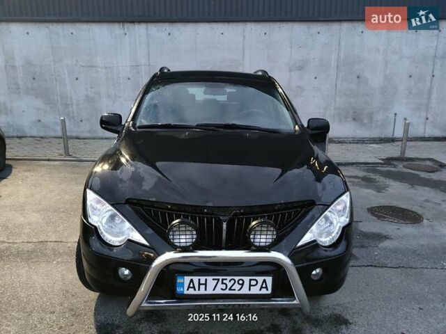 Черный Cанг Йонг Актион, объемом двигателя 2.3 л и пробегом 180 тыс. км за 4500 $, фото 1 на Automoto.ua