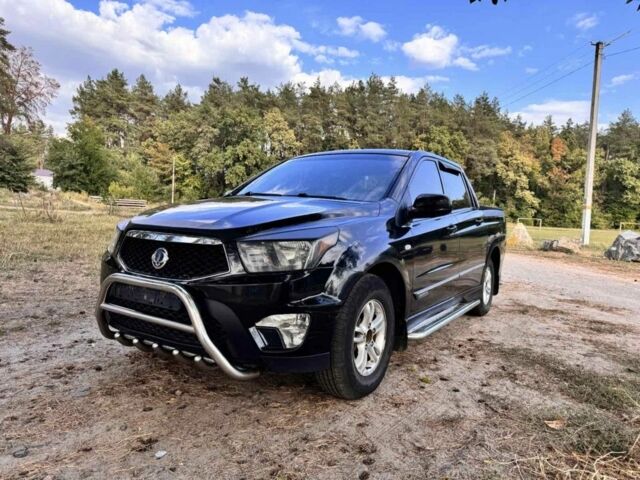 Черный Cанг Йонг Актион, объемом двигателя 2 л и пробегом 240 тыс. км за 8200 $, фото 1 на Automoto.ua