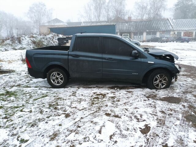 Синий Cанг Йонг Актион, объемом двигателя 2 л и пробегом 281 тыс. км за 2400 $, фото 1 на Automoto.ua